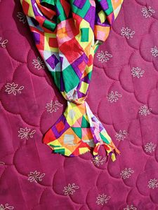 Multi Coloured Cotton Kurti With Pearls Attached On The Neck And Bottom Part.