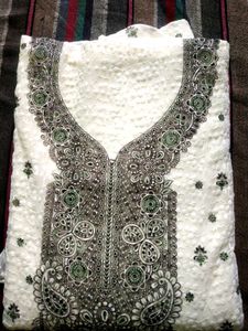 Elegant White Kurta Set with Intricate Embroidery