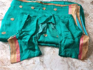 Elegant Teal Saree with Gold Embroidery