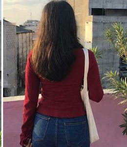 Maroon ribbed V-neck long sleeve top