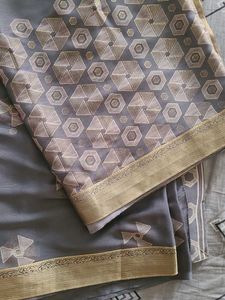 Elegant Grey Saree with Gold Border