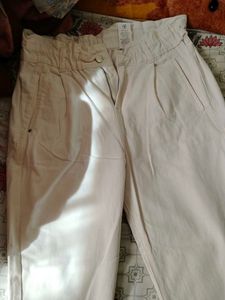 A New White Denim Jeans With Pockets.