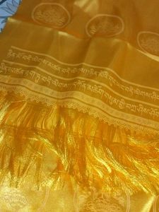Traditional yellow Tibetan khata scarf