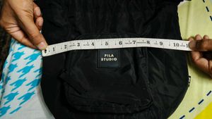 FILA STUDIO Drawstring Sling Bag