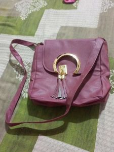 Chic Dusty Rose Crossbody Bag with Tassel Detail