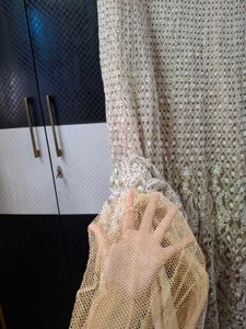Elegant Beige Embroidered Anarkali gown