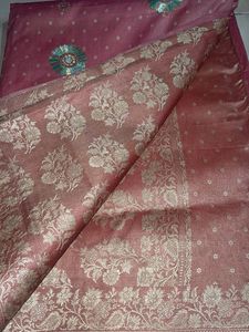 Elegant Pink Saree with Floral Motifs