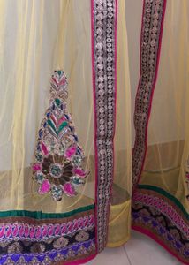 Embroidered Yellow Net Jacket Style Kurta