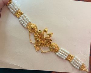 Elegant Pearl & Gold Peacock Choker Necklace