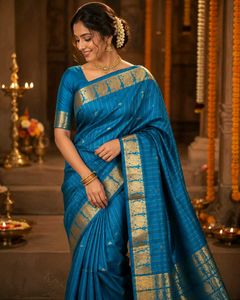 Stunning Teal Silk Saree with Gold Border