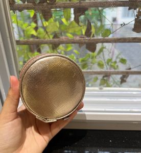Tira Gold Round Makeup Case