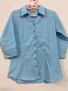 Light Blue Collared Button-Up shirt