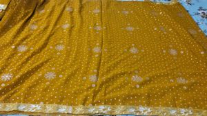 fix rate mustard totally new sari with stitch blou