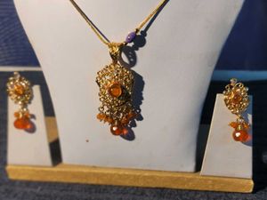 Orenge Locket With Ear Rings