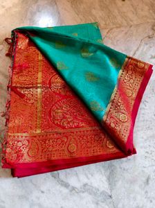 Vibrant Blue Silk Saree with Floral Border red col