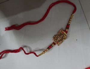 veera oxidised gold brooch rakhi