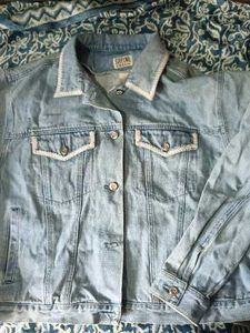Light Wash Denim Jacket with White Trim
