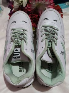 White Sneakers with Cute Eyelash Design