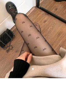 Sheer Black Tights with Hat Pattern