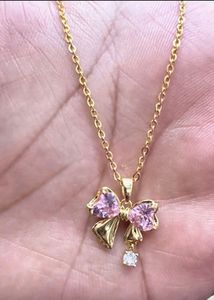 Gold Bow Pendant Necklace