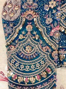 Exquisite Morni Blue Embellished Lehenga Set