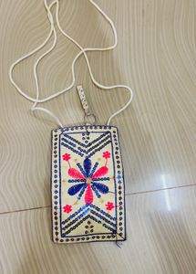 Embroidered Clutch with Tassels