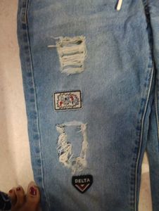 Distressed Patch Jeans