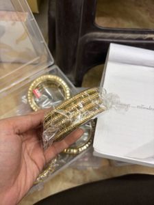 Elegant Gold Bangles with Mirror Work
