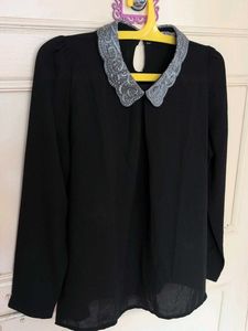 Chic Black Top with Embellished Collar