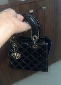 Chic Black Quilted Handbag offer