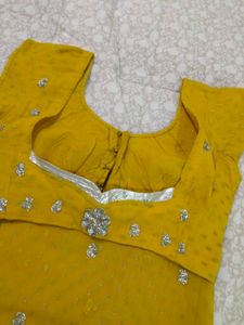 Yellow saree with Silver Embellishments