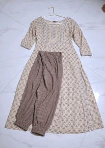 Elegant Kurta Set with Tassel Bag