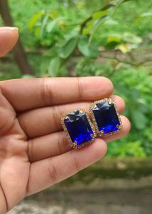 Classic Sapphire Earrings With Diamonds Around It