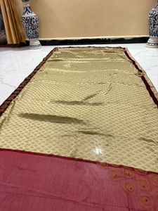 Elegant Cream and Red Saree with Gold Border