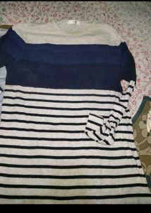 Striped top with distressed jeans