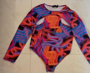 Vibrant Cut-Out Long Sleeve Top