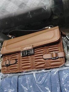 Stylish Brown Handbag with siling belt