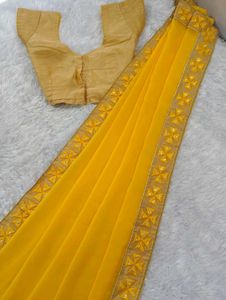 Bright Yellow Saree With Embellished Blouse