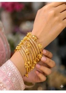 Elegant Gold Bangles with Bell Charms