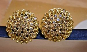 golden round studs