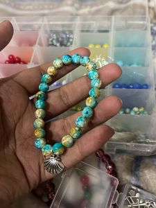 blue Beaded Bracelet with Shell Charm