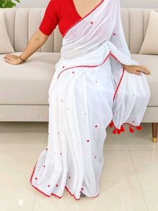 White Saree with Red Embellishments