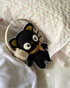 black cat cuddle plushie