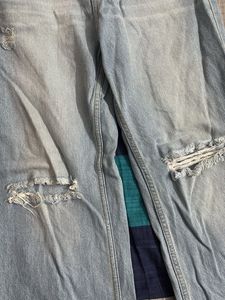 Ripped Knee Jeans