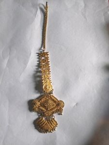 Neckpiece And Tika