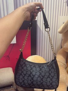 Coach Signature Hobo Bag