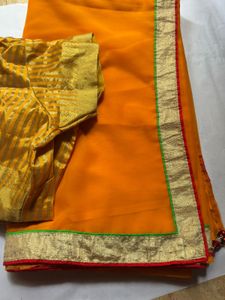 Vibrant Yellow Saree with Golden Border