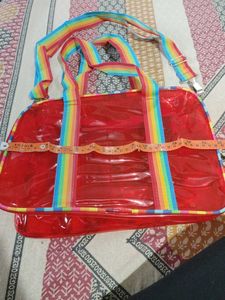 Red Jelly Duffle Bag with Rainbow Strap