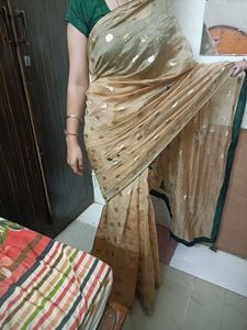 Elegant Golden Saree with Unique Print