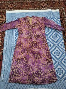 purple golden kurta with beige colour lining